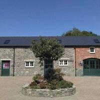 TAL Y CAFN studios courtyard with tree